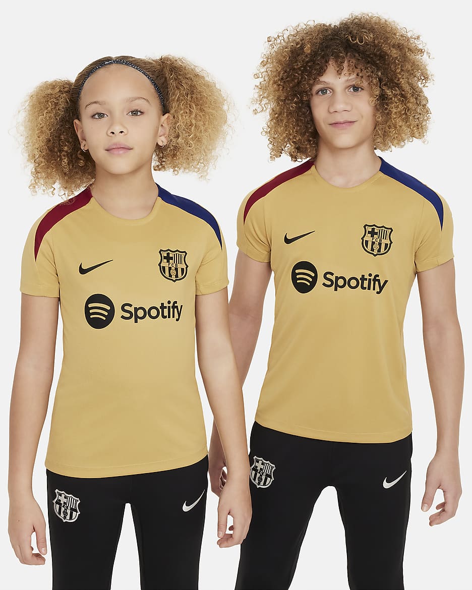 F.C. Barcelona Strike Older Kids Nike Dri FIT Football Short Sleeve Knit Top